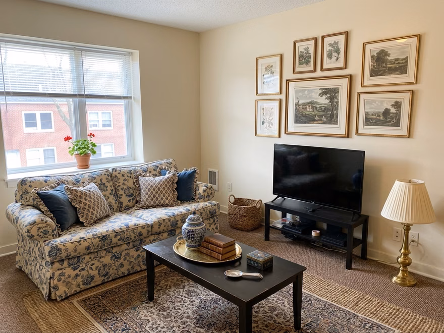 A living room redesigned in Grandmillennial style by RoomDesignAI