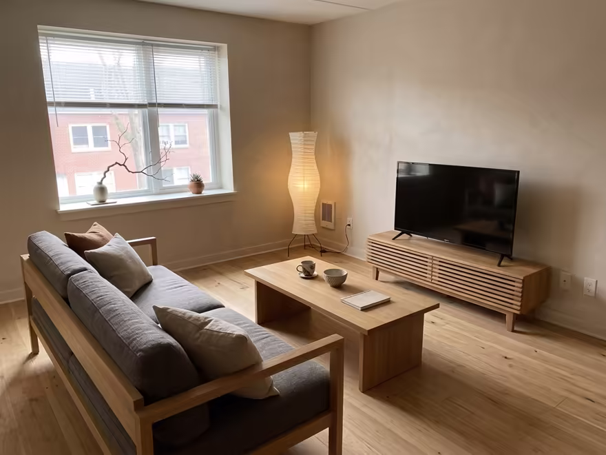 The hero living room redesigned in Japandi style