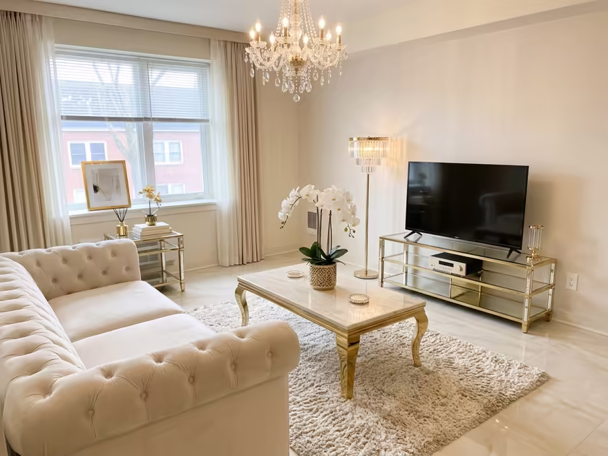 The hero living room redesigned in Luxury Glam style